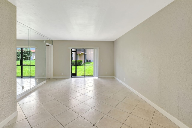 view of tiled empty room