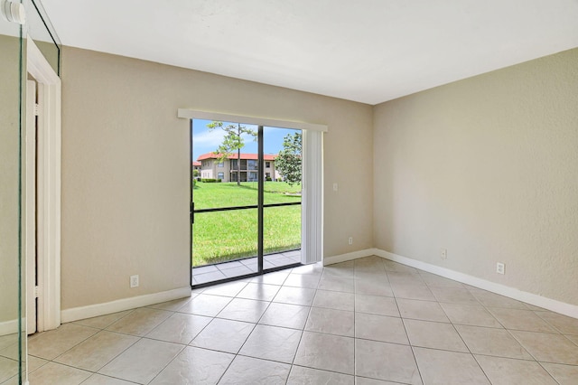 view of tiled spare room