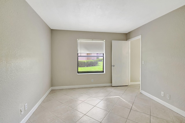 view of tiled empty room