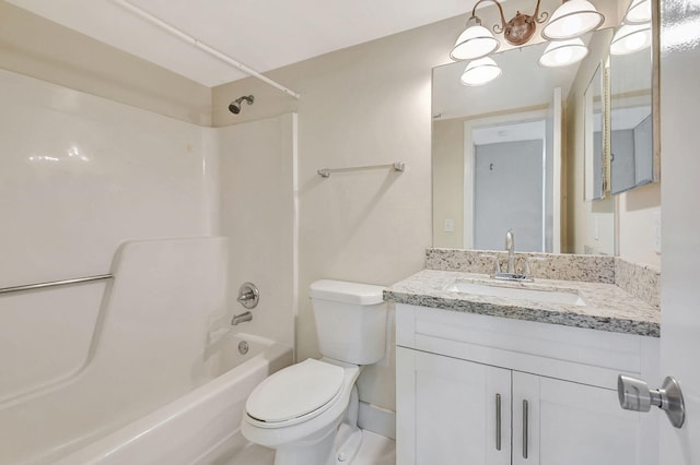 full bathroom with toilet, bathing tub / shower combination, and vanity