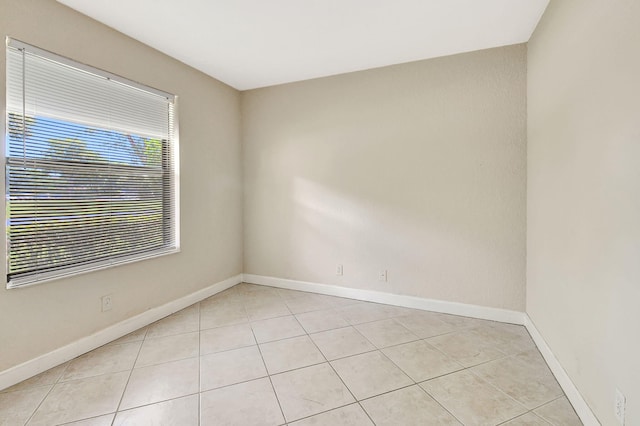 view of tiled spare room