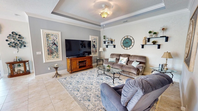 living room with light tile patterned floors, a textured ceiling, a raised ceiling, and crown molding