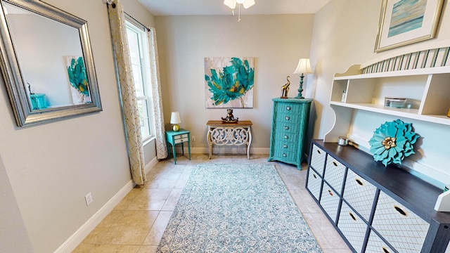 hallway featuring light tile patterned flooring