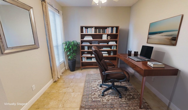 tiled home office featuring ceiling fan