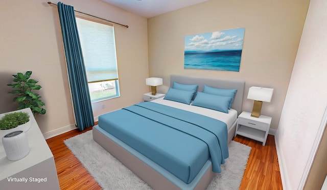 bedroom featuring hardwood / wood-style floors