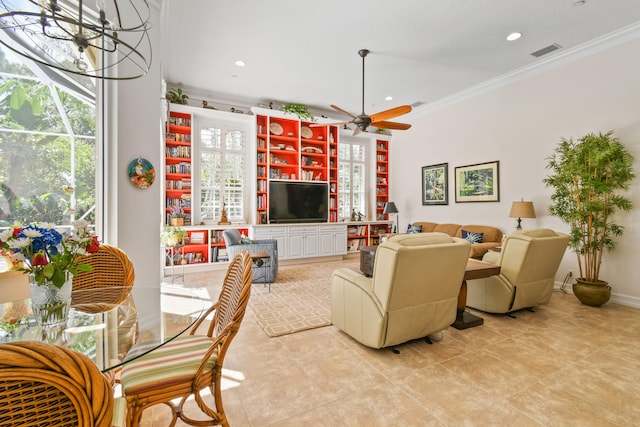 tiled living room with ceiling fan with notable chandelier and crown molding