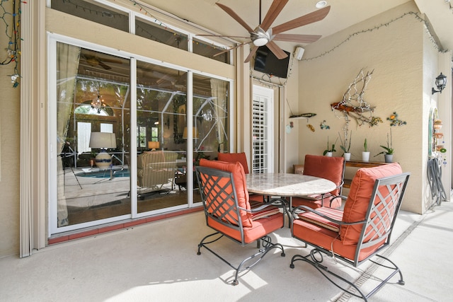 view of patio / terrace featuring ceiling fan