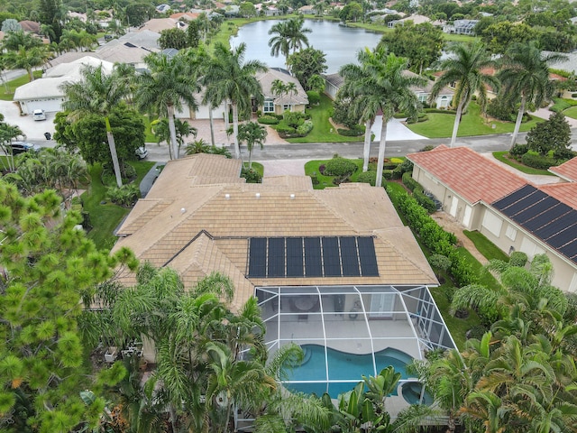 drone / aerial view with a water view