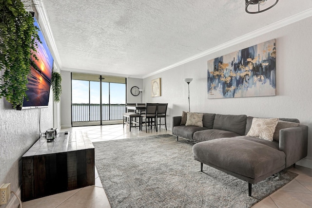 living room featuring light tile patterned floors, crown molding, and a textured ceiling