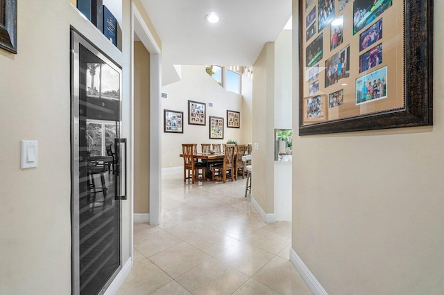 hallway featuring light tile patterned flooring