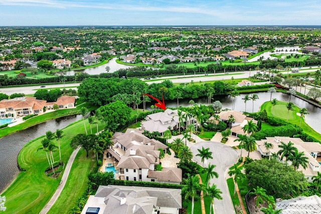 bird's eye view with a water view