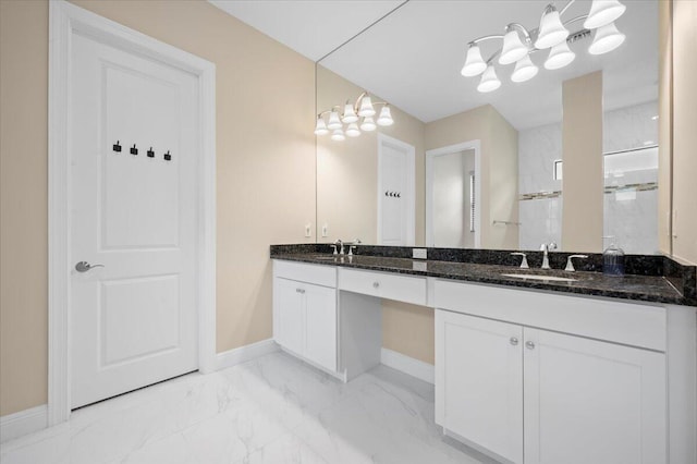 bathroom featuring walk in shower and vanity