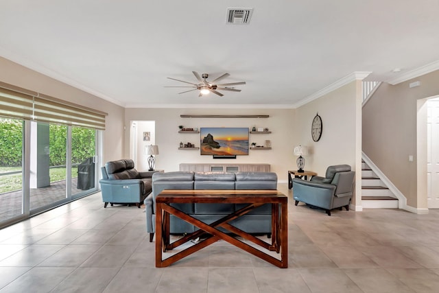 living room with crown molding and ceiling fan