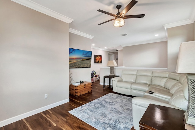 living room featuring ceiling fan, ornamental molding, and dark hardwood / wood-style floors