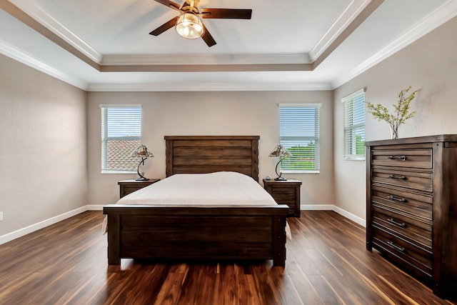 bedroom featuring ceiling fan, ornamental molding, and multiple windows