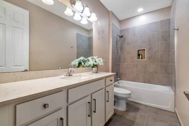 full bath featuring shower / bath combination, tile patterned flooring, toilet, and vanity