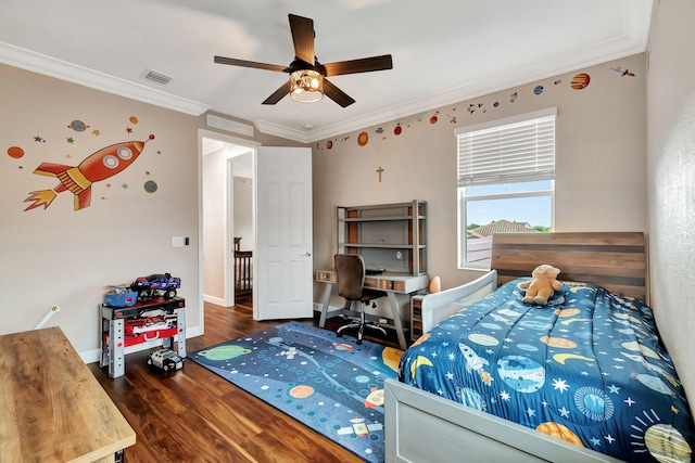 bedroom with dark wood-type flooring, visible vents, ornamental molding, and baseboards