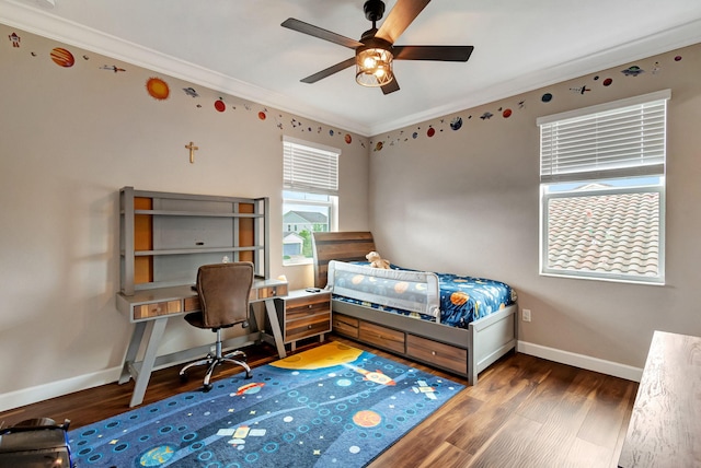 bedroom featuring ceiling fan, baseboards, dark wood-type flooring, and ornamental molding