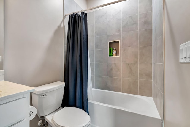 bathroom with toilet, vanity, and shower / bathtub combination with curtain