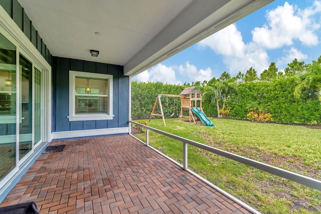 view of patio with a playground