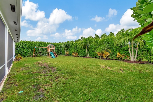 view of yard with a playground