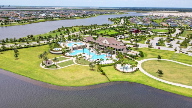 bird's eye view featuring a water view and a residential view