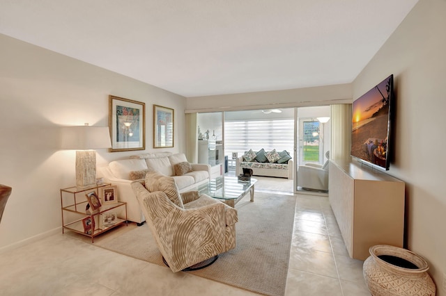 living room with light tile patterned flooring