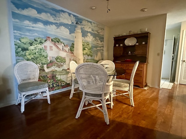 dining area featuring hardwood / wood-style floors