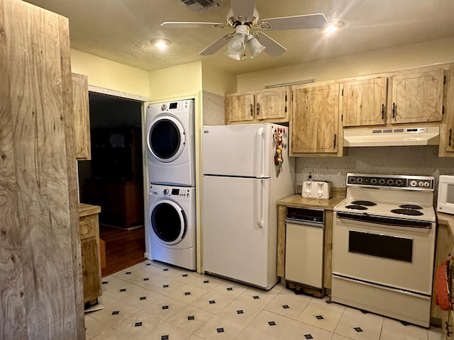 kitchen with stacked washer / drying machine, ceiling fan, white appliances, and light brown cabinetry