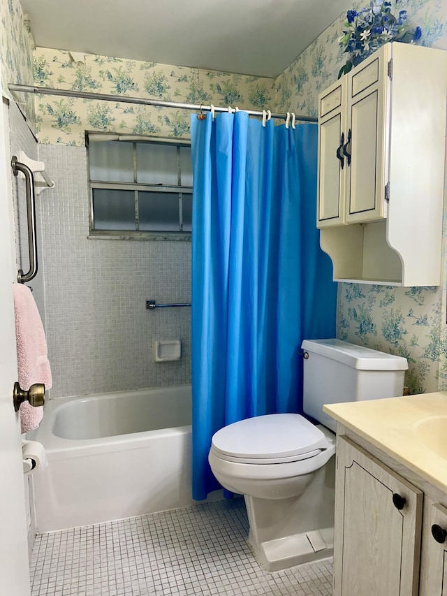 full bathroom featuring tile patterned floors, vanity, shower / bath combo, and toilet