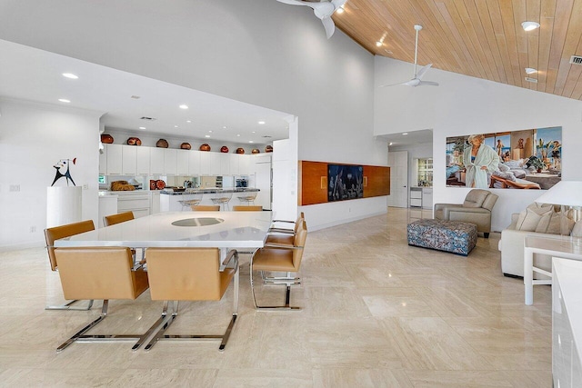 dining space featuring visible vents, baseboards, wooden ceiling, high vaulted ceiling, and recessed lighting