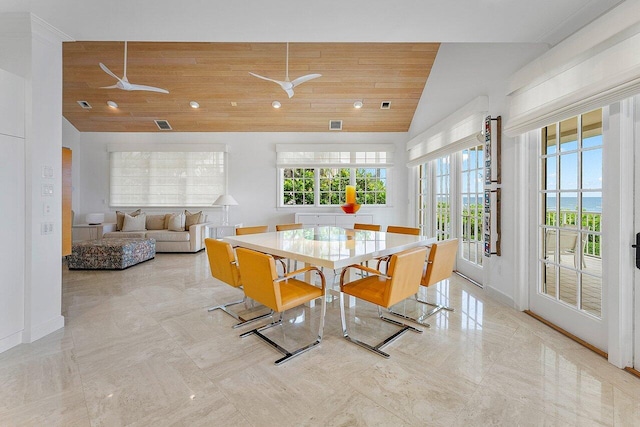 dining room with ceiling fan, wood ceiling, visible vents, and vaulted ceiling