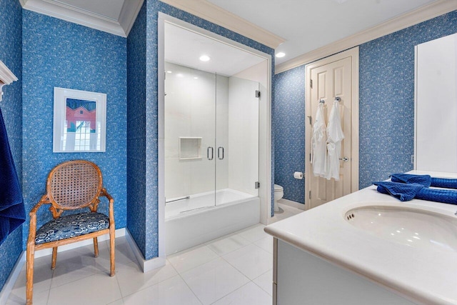 bathroom featuring toilet, wallpapered walls, and crown molding