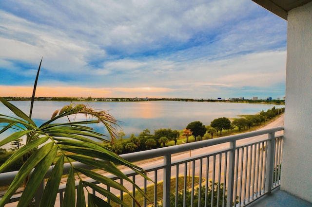 balcony at dusk with a water view