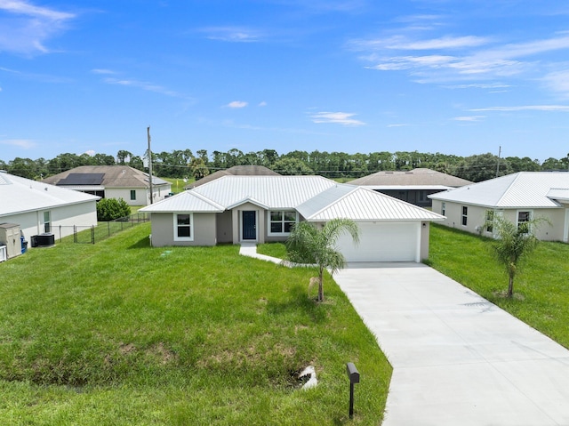 single story home with a garage and a front yard