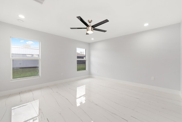 empty room featuring ceiling fan