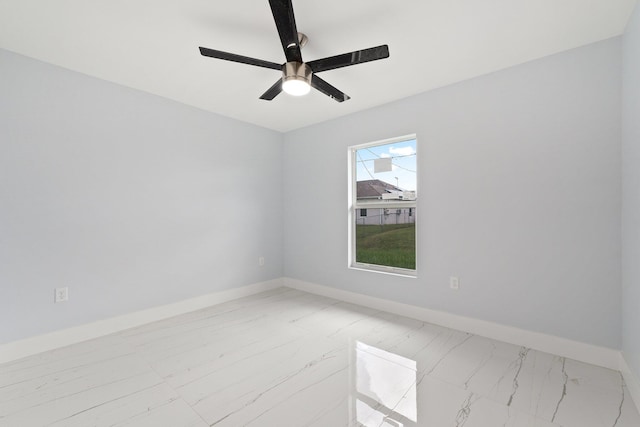 spare room featuring ceiling fan