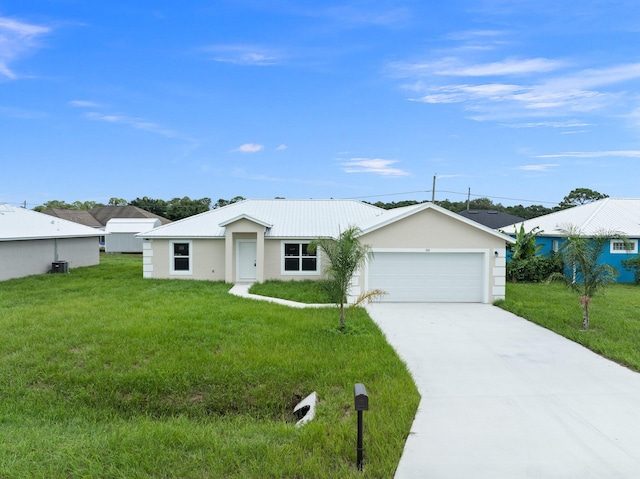 ranch-style house with a garage and a front lawn