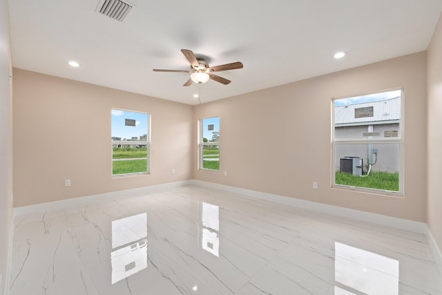 spare room featuring ceiling fan