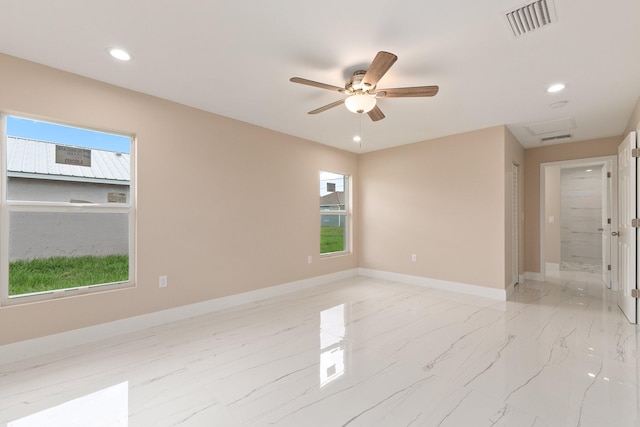 unfurnished room featuring ceiling fan