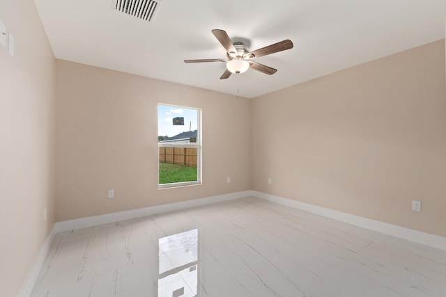 unfurnished room with ceiling fan