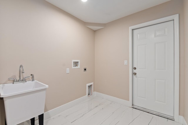 clothes washing area with hookup for a washing machine, hookup for an electric dryer, and sink