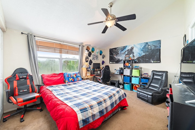 bedroom featuring ceiling fan, carpet floors, and vaulted ceiling