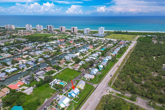 drone / aerial view featuring a water view