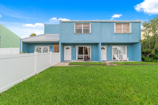 exterior space with a front lawn