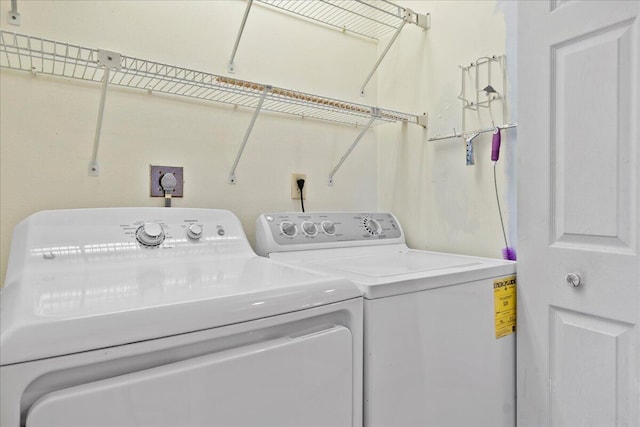 laundry area featuring washing machine and dryer