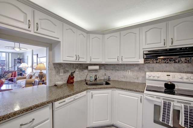 kitchen featuring sink, white appliances, white cabinets, and decorative backsplash