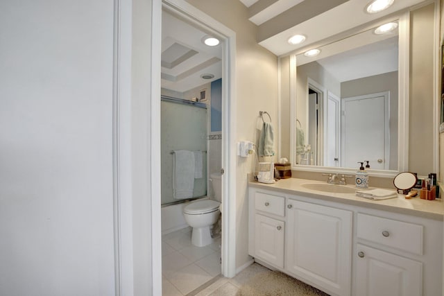 full bathroom with combined bath / shower with glass door, vanity, toilet, and tile patterned floors