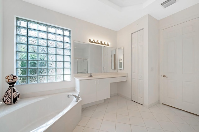 bathroom featuring a garden tub, vanity, visible vents, tile patterned floors, and a stall shower