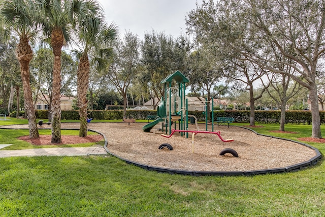 view of jungle gym with a lawn